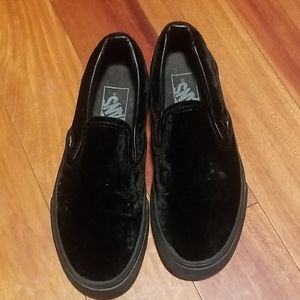 Van's classic black velvet slip on shoes.